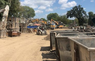 Eddie’s Scrap Metal Removal Scrap metal dealer at Follow Sidewalk Around Back