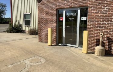 Rhodes Auto S/S/S Used auto parts store at 310 W 10th St