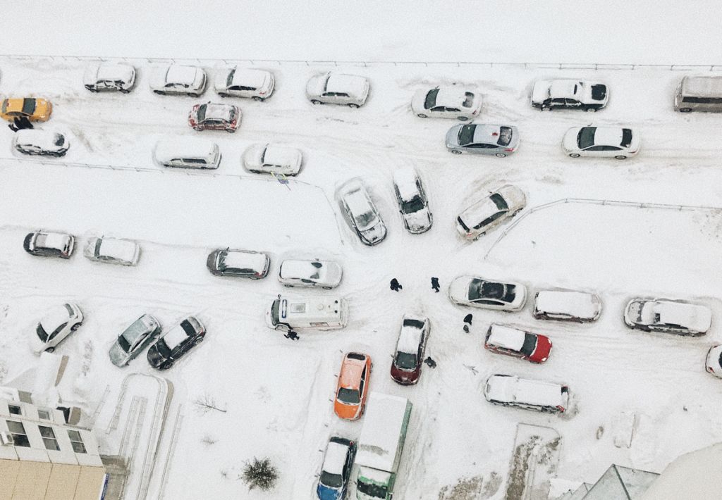 Cars tuck in the snow in winter
