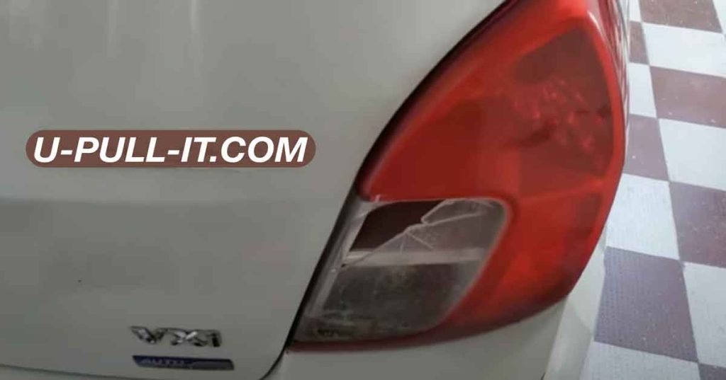 Replace a broken tail light with a used one from a junkyard
