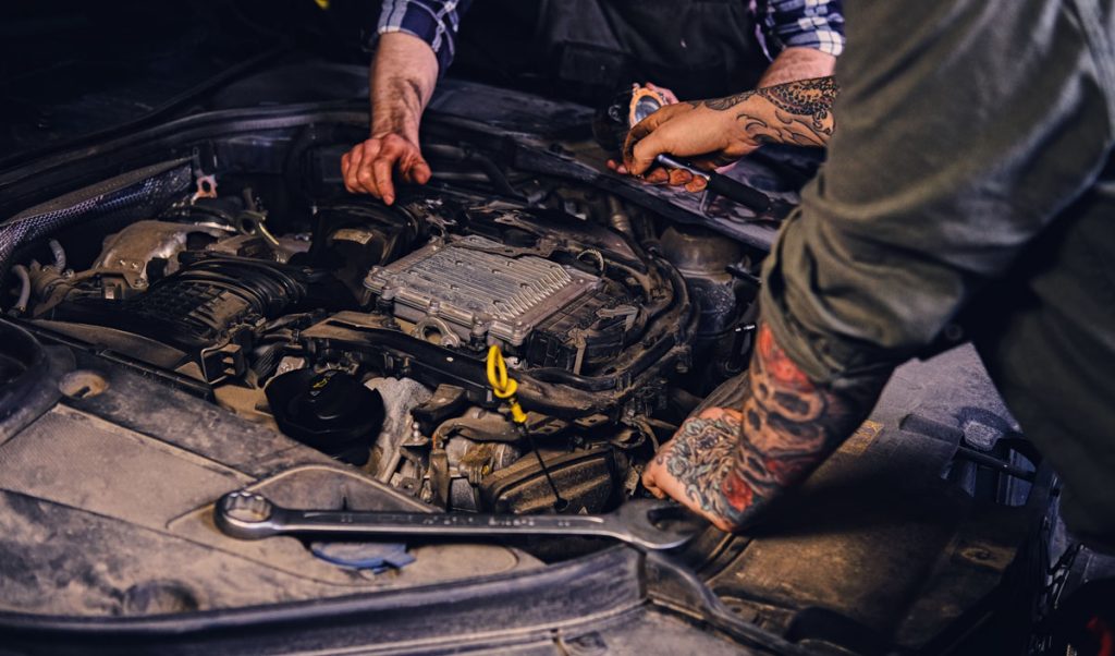 Removing an AC compressor from a junk car